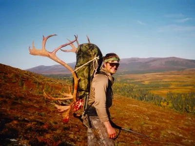 Billy Molls Packing Caribou in the Alaska Wilderness