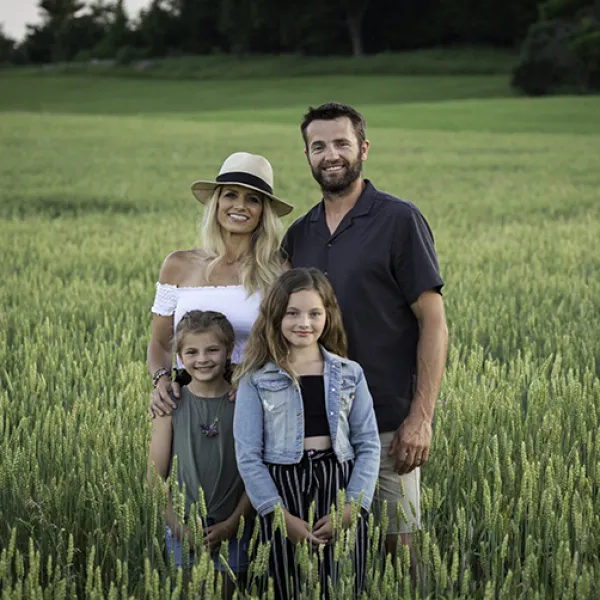 Billy Molls Family in green field in Wisconsin